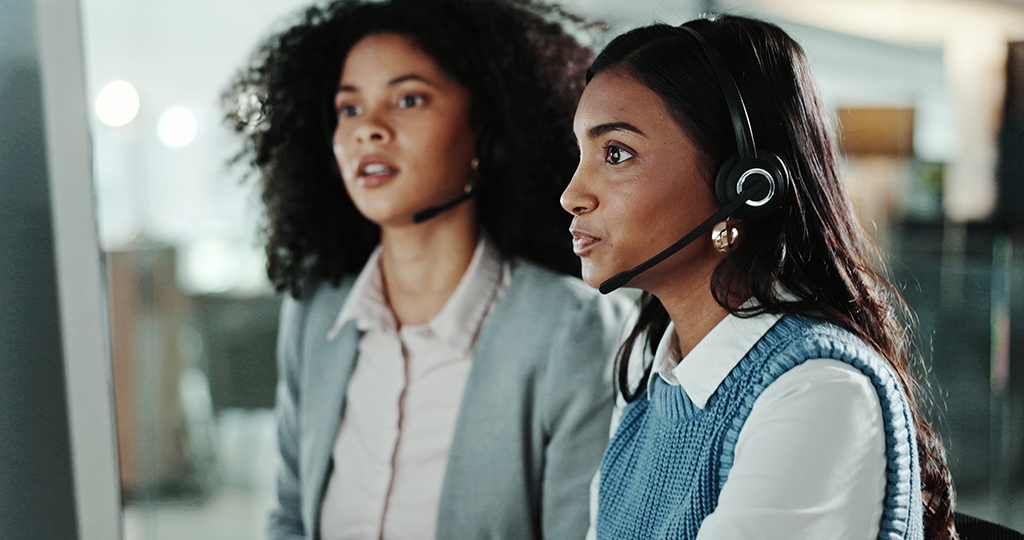 call-centre agents looking at screen fixing a planning mistake